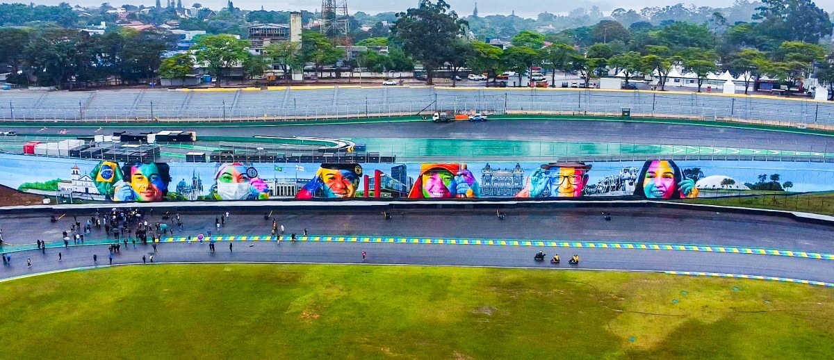 Kobra une Senna e moradores em mural de Interlagos